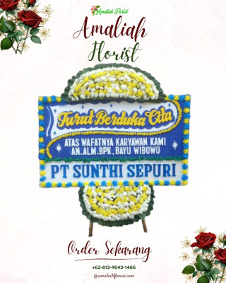 Papan Bunga Duka di Patung